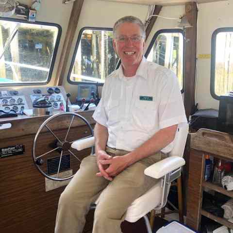 a man sitting on a bus