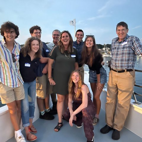 a group of people posing for a photo