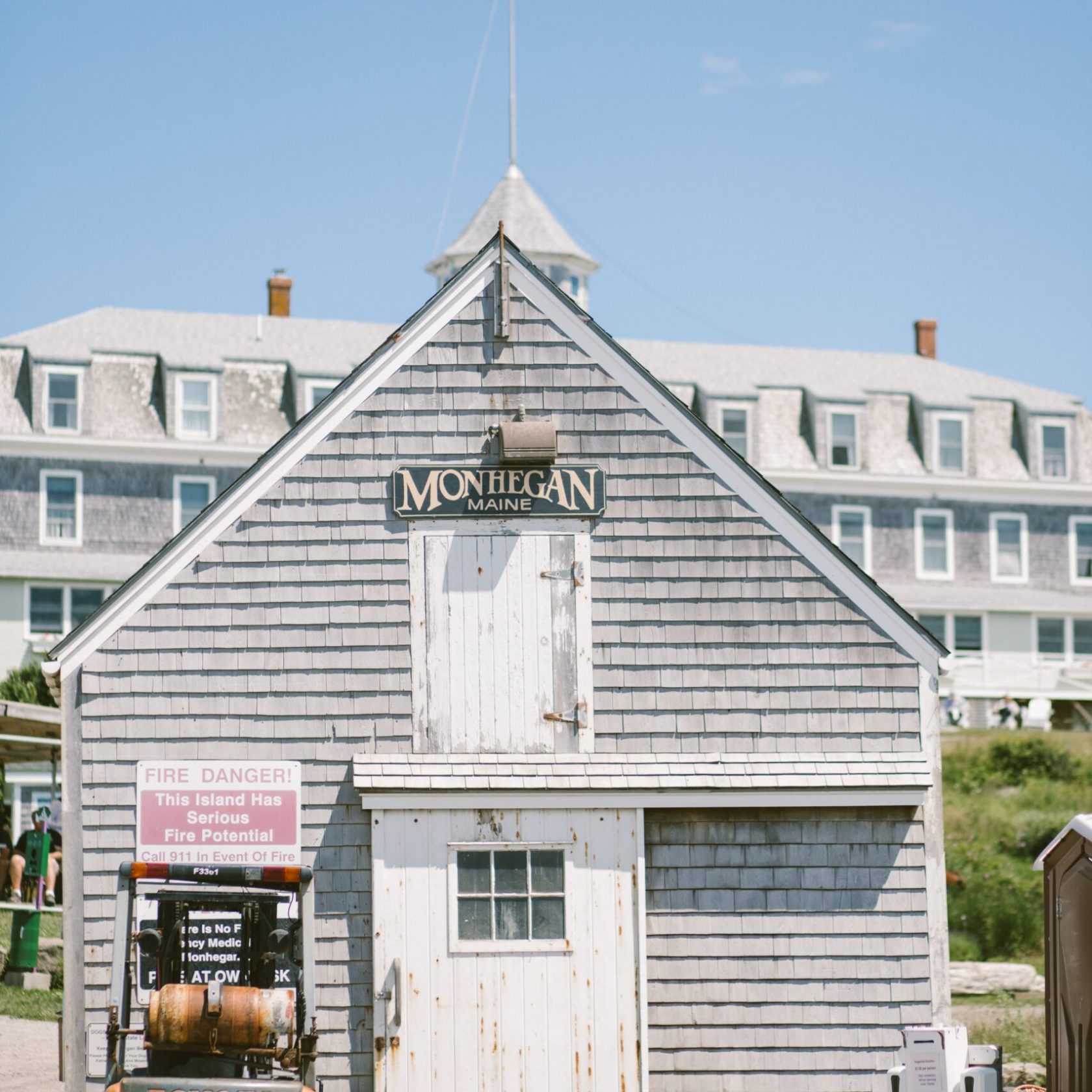 a truck is parked in front of a building
